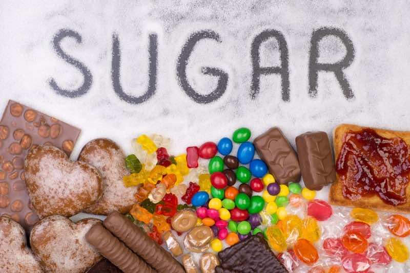 Food containing sugar. Too much sugar in diet causes obesity, di