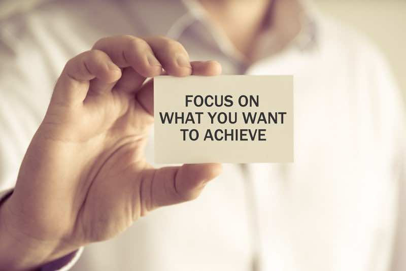 Businessman Holding Focus On What You Want To Achieve Message Ca