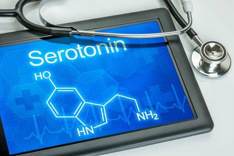 Tablet with the chemical formula of serotonin
